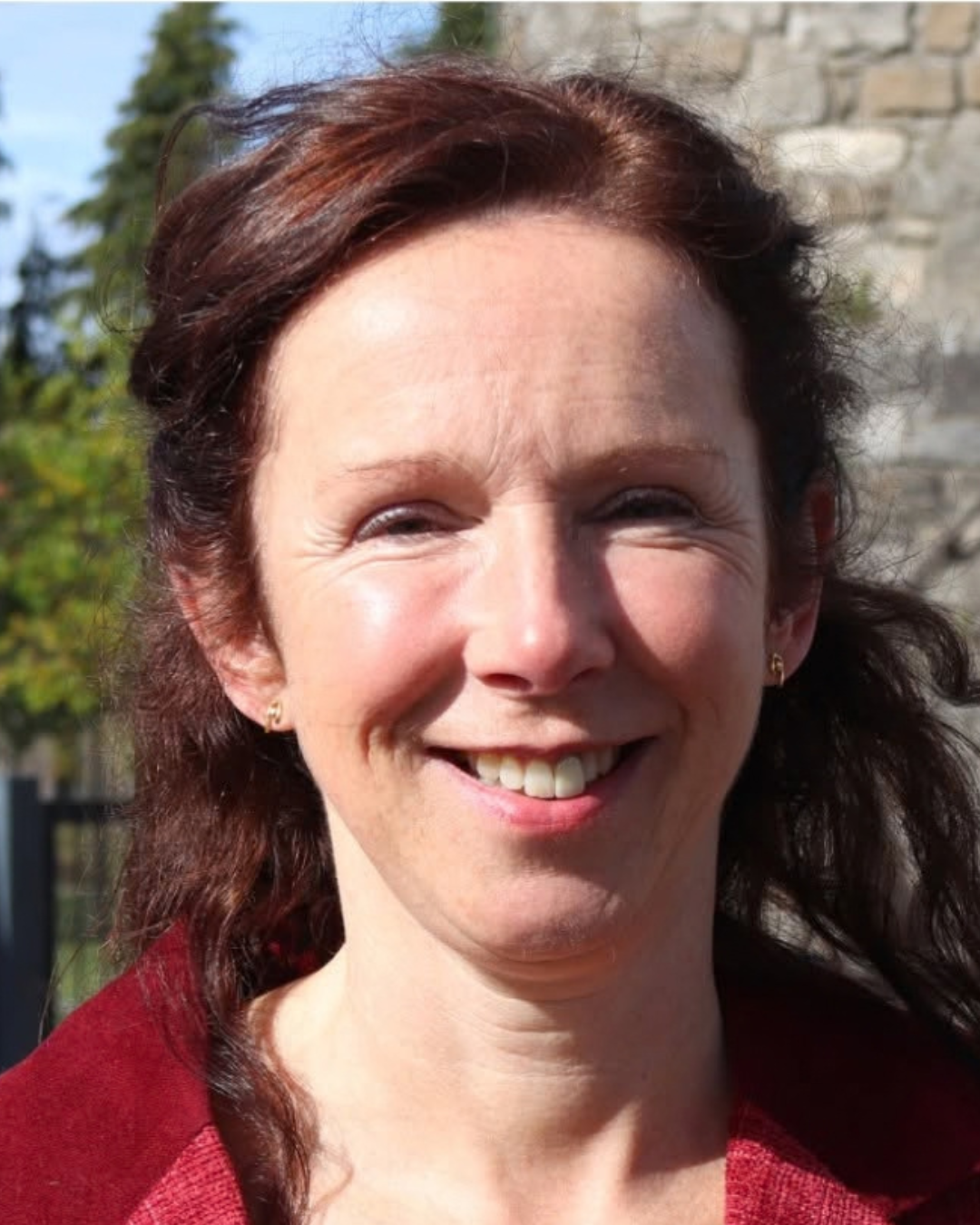 Cllr Linda de Courcy smiling outdoors