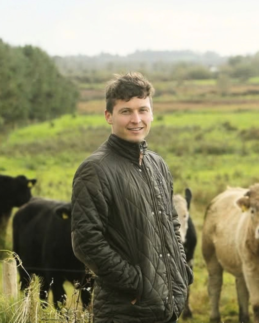 Paul Lawless TD standing in a field
